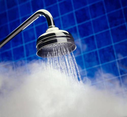 a shower with water coming out of it at Hotel Aguila in Guadalajara