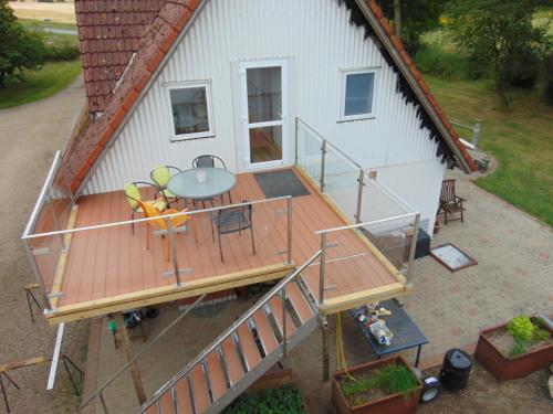 an overhead view of a house with a deck at Verstvej bed and brekfast in Egtved
