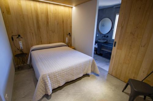 מיטה או מיטות בחדר ב-La Pallissa de Cal Esquerrà