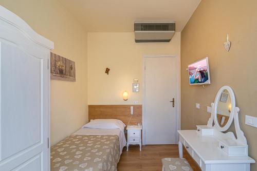 Katil atau katil-katil dalam bilik di Hotel Mariani
