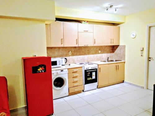 Kuchyň nebo kuchyňský kout v ubytování Demy's apartment