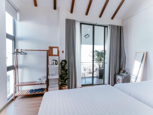 Ένα ή περισσότερα κρεβάτια σε δωμάτιο στο Daisy House