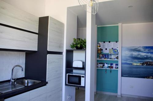 Una cocina o zona de cocina en Tra cielo e mare