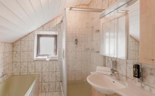 Koupelna v ubytování Gasthof Höhenrain