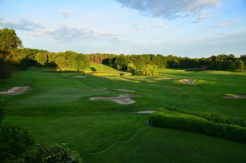 an aerial view of a golf course at Golf Hotel Castelconturbia in Agrate Conturbia
