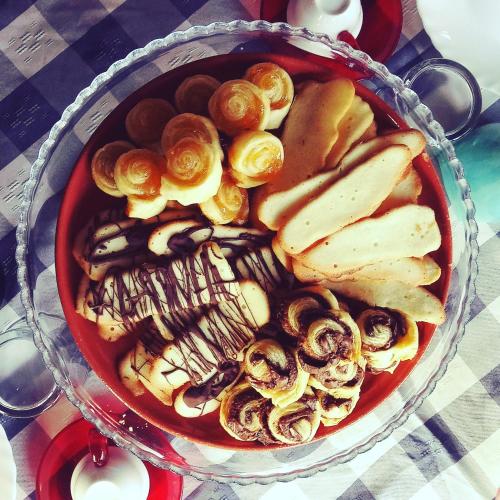 a pan filled with mushrooms and other foods on a table at Idria B&B in Barcellona-Pozzo di Gotto