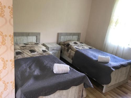 Postel nebo postele na pokoji v ubytování Maxvshi