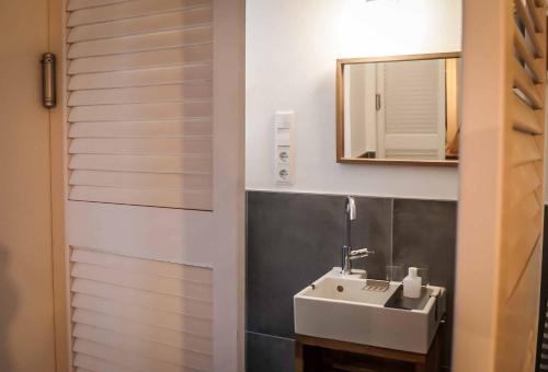 Vonios kambarys apgyvendinimo įstaigoje Besighomes Apartment Tiny House