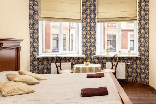 Postel nebo postele na pokoji v ubytování Dagda Central apartment