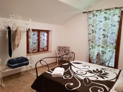 Posteľ alebo postele v izbe v ubytovaní Bed & Breakfast La Tana dei Sognatori