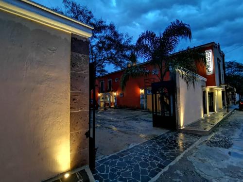 a building with a sign on the side of it at Hotel Boutique Real Tequila in Tequila