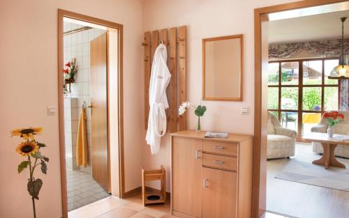 a bathroom with a sink and a mirror at Ferienwohnung Cornelia in Bad Birnbach