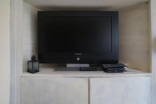 A television and/or entertainment centre at Katerina's apartment