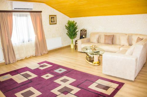 Area tempat duduk di Apartament Sofia