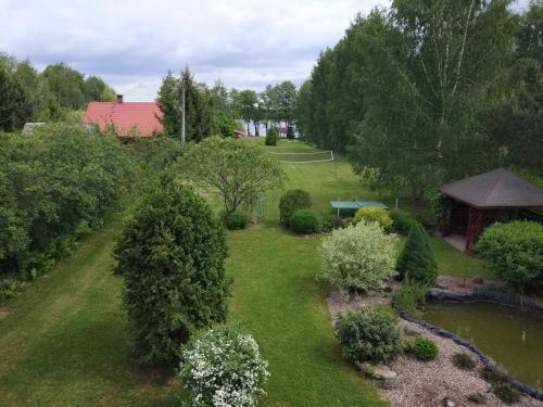 an aerial view of a garden with a gazebo at Dom gościnny Krasne in Krasnopol