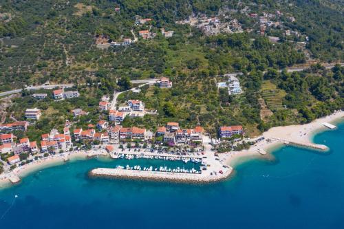 an aerial view of a resort with a beach at Sun Paradise in Podgora