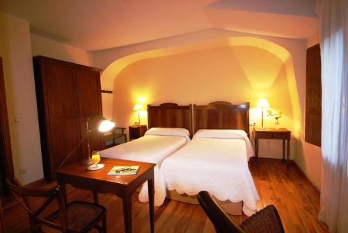 Posteľ alebo postele v izbe v ubytovaní Hotel Del Verde Al Amarillo