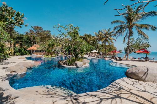 a pool at the resort at Bintang Flores Hotel in Labuan Bajo