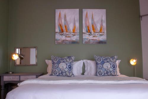 Voodi või voodid majutusasutuse Swakop Strand Cottage Unit C toas