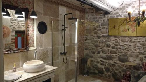 a bathroom with a shower and a sink at Appartements Ria Sirach in Ria