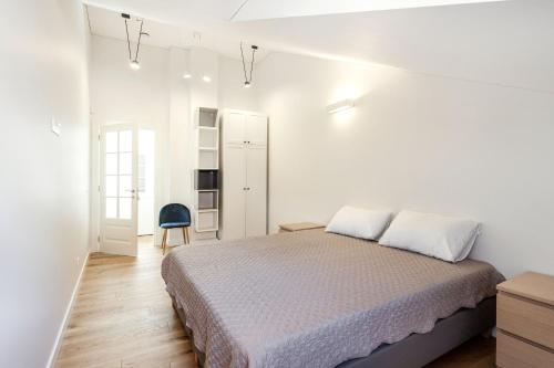 Ένα ή περισσότερα κρεβάτια σε δωμάτιο στο Twin apartments 3 Bedr by Reside Baltic