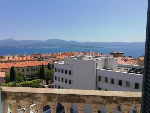 a view of a city from a balcony at Villa Cécile in Ajaccio