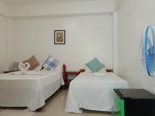 Un pat sau paturi într-o cameră la ARAMARA Resort