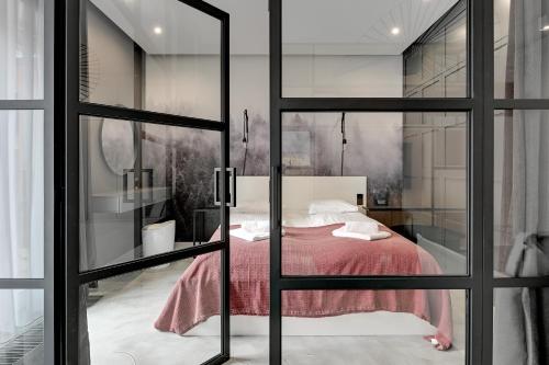 Postel nebo postele na pokoji v ubytování Comfort Apartments Rajska