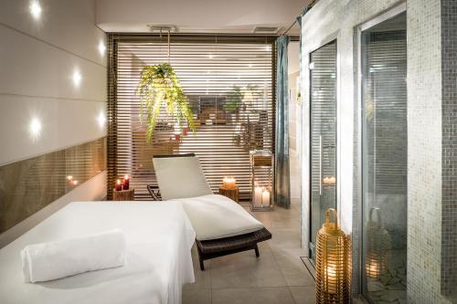 Ένα ή περισσότερα κρεβάτια σε δωμάτιο στο Grand Hotel Salsomaggiore