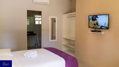 Cama ou camas em um quarto em Hotel pousada & Eventos Cassino