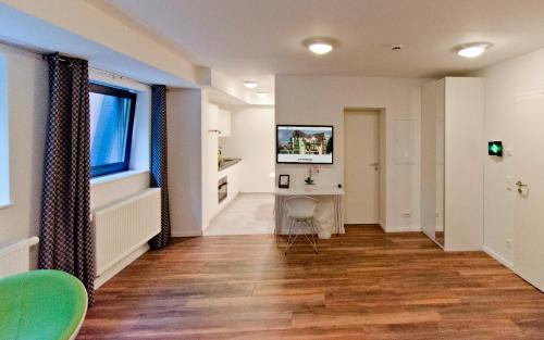 Televisyen dan/atau pusat hiburan di Eco Smart Apartments Nürnberg Süd
