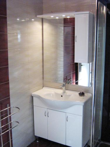 Ванная комната в Orange Bamboo Suite