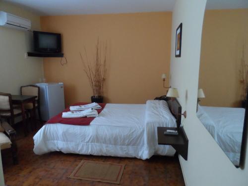 Katil atau katil-katil dalam bilik di Hotel Minas