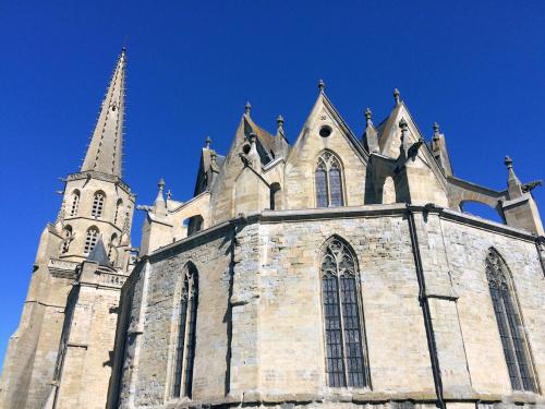 an old church with a tower and a steeple at loft At Besset in Besset