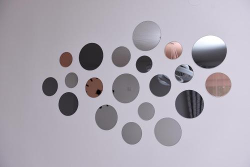 a bunch of different types of balls on a wall at Lux Apartman Casablanca in Pluzine