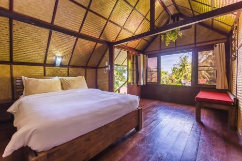 Katil atau katil-katil dalam bilik di Coral View Resort