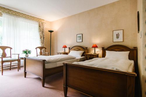Ένα ή περισσότερα κρεβάτια σε δωμάτιο στο Landhaus Keller - Hotel & Restaurant