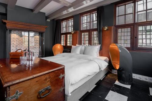 Un ou plusieurs lits dans un hébergement de l'établissement Boutique Hotel The Craftsmen