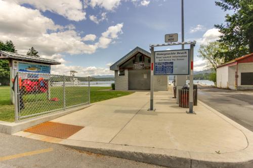 a bus stop with a sign on the sidewalk at DeJa View in Hayden