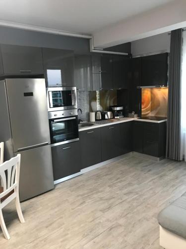 Η κουζίνα ή μικρή κουζίνα στο Astoria Romantic Residence