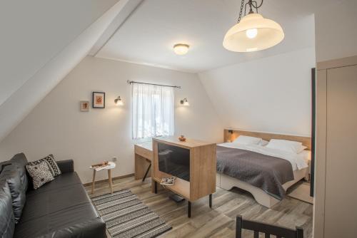En eller flere senge i et værelse på The Starlings Apartments Plitvice Lakes