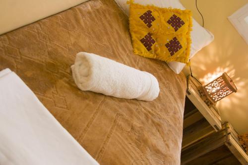 a roll of toilet paper sitting on top of a counter at GOLVEN Surf in Taghazout