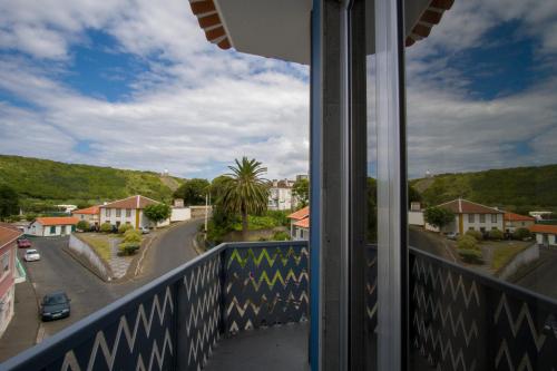 a balcony with a view of a street at ZIGZAG HOSTEL in Praia da Vitória