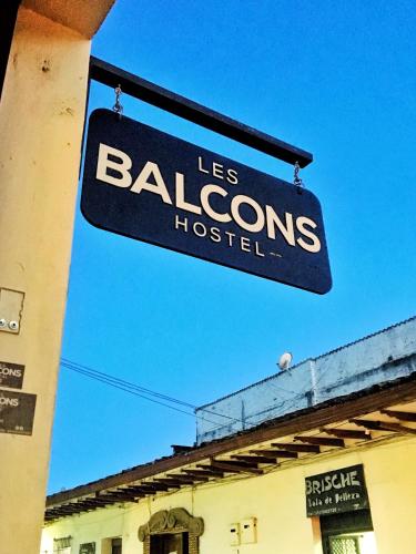 a sign that reads les baxterons hospital on a building at Les Balcons Hostel in Popayan