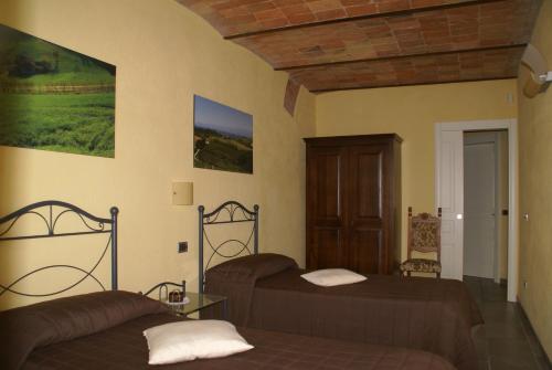 A bed or beds in a room at Bricco Torricella