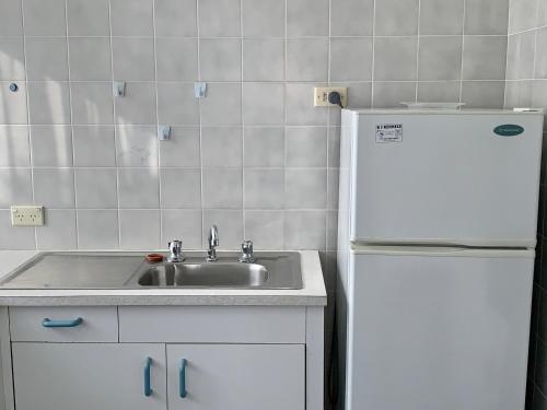 Kuchyň nebo kuchyňský kout v ubytování Lemontree Cottage