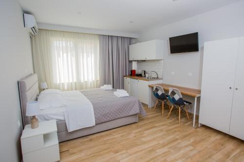 Letto o letti in una camera di Athens Raise Acropolis Project