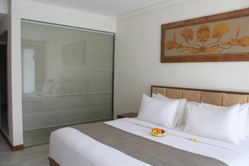 Cama o camas de una habitación en Purana Suite Ubud
