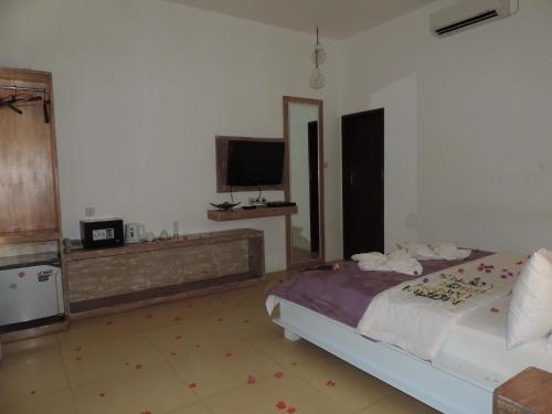 Кровать или кровати в номере Casus Dream Hotel