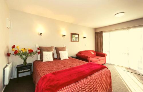 Postel nebo postele na pokoji v ubytování Cranford Oak Motel